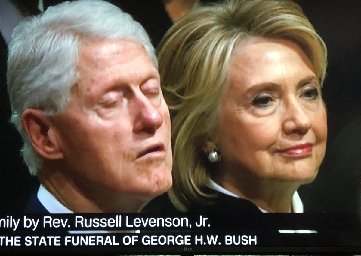 Bill Clinton falls asleep, mouth agape; Hillary rocks back