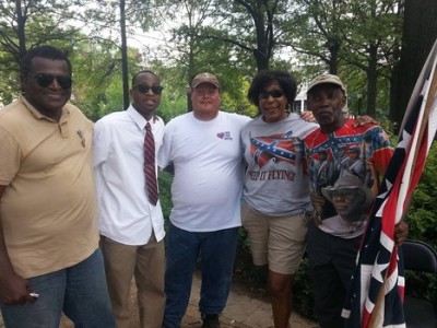 Confederate supporters Anthony Hervey, far left, and Arlene Barnum, second from right, were reportedly run off the road in a crash that killed Hervey Sunday morning.