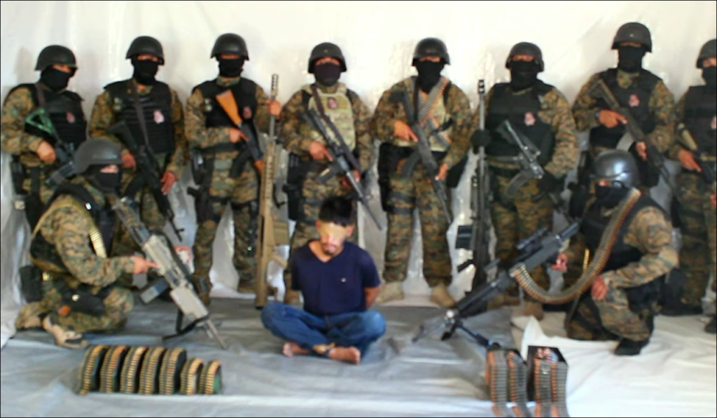 Image result for BORDER WAR: Cartel enforcers brandish anti-aircraft guns, military body armor in shock hostage video