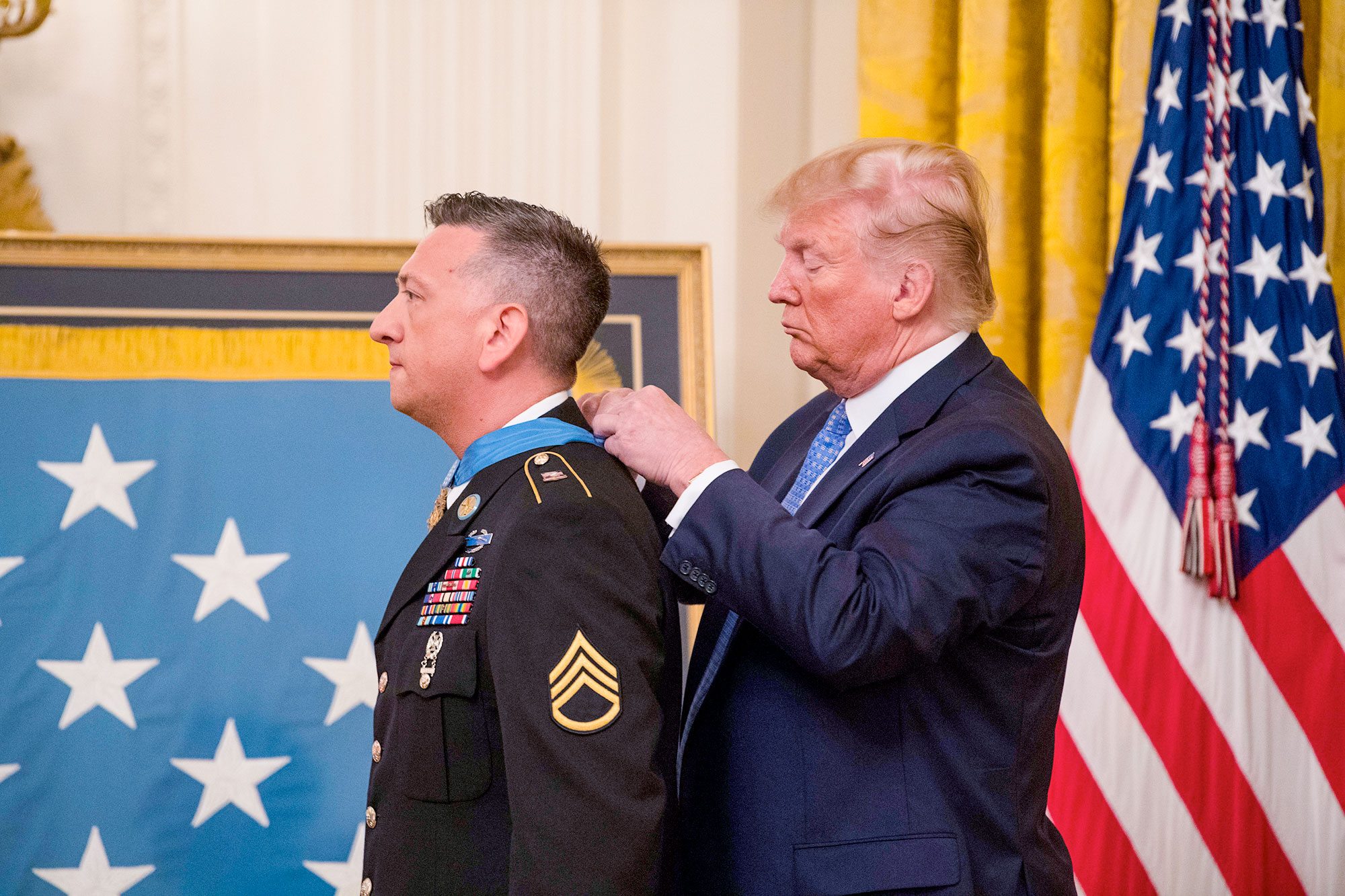 President Donald J. Trump presents the Medal of Honor to former Army Staff Sgt. David G. Bellavia during a ceremony at the White House in Washington, D.C., June 25, 2019.