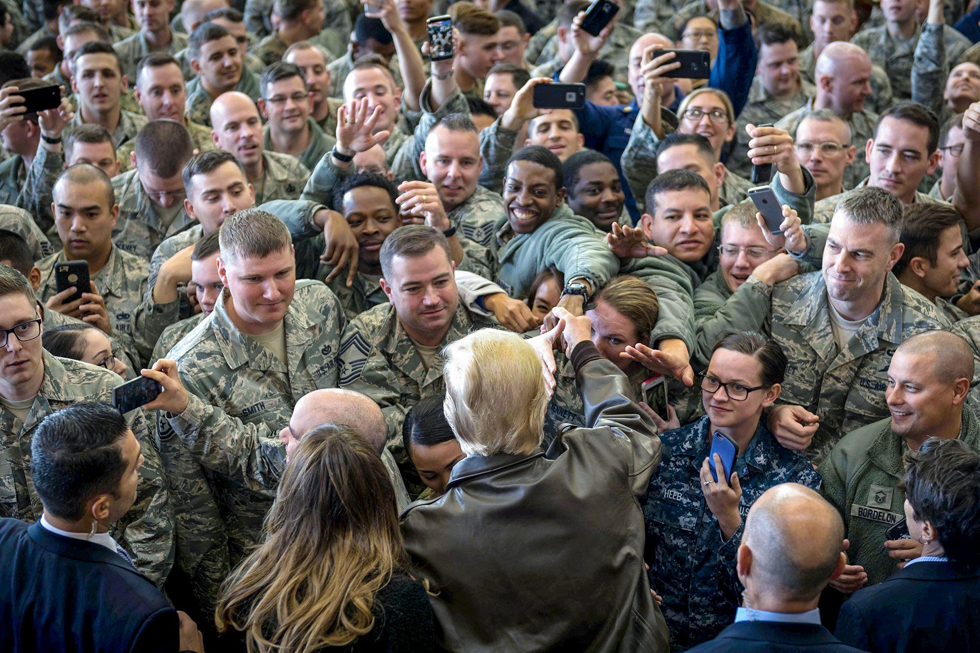 President Donald J. Trump greets service members during a troop talk at Yokota Air Base, Japan, Nov. 5, 2017. During his talk, Trump highlighted the importance of the U.S. – Japan alliance in the Indo-Asia Pacific region. Air Force photo by Airman 1st Class Juan Torres